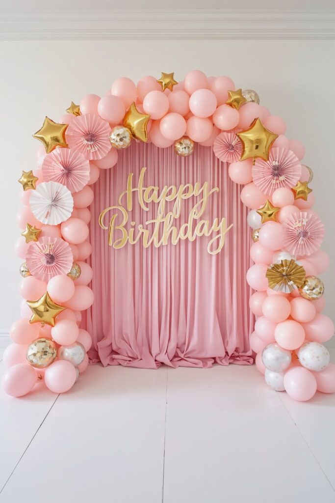 Airy Girls' Birthday Setup with Pastel Balloon Backdrop Design
