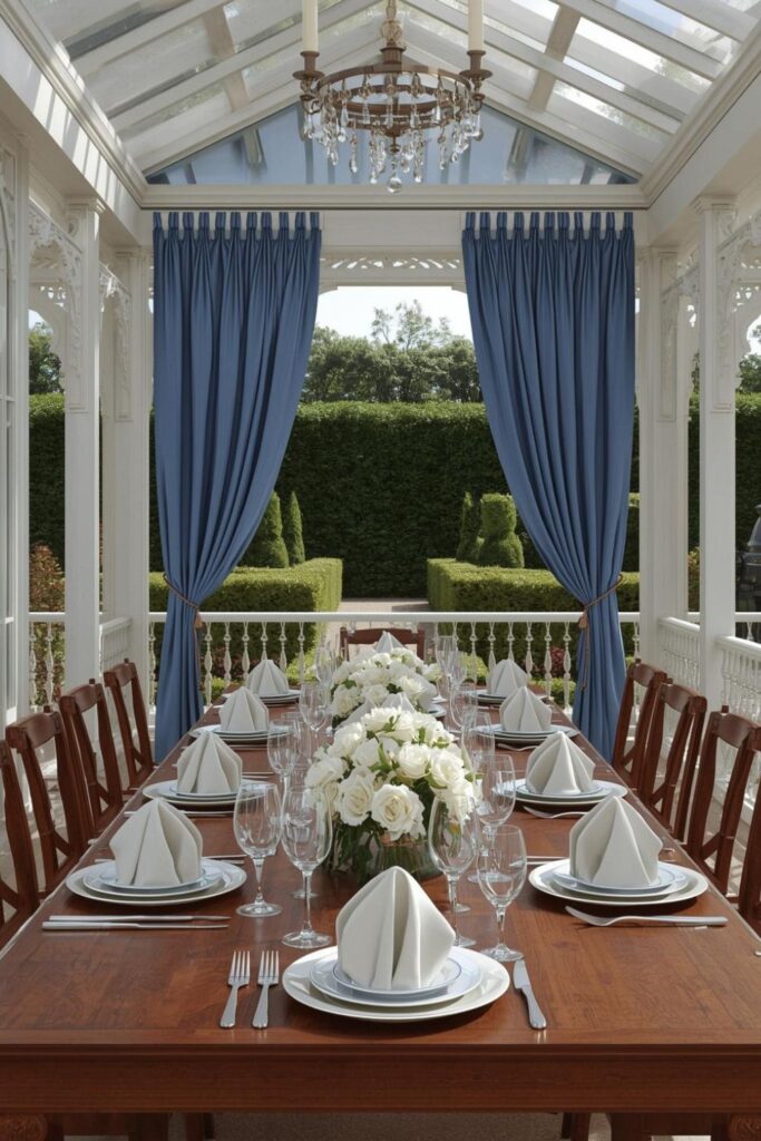 Classic Formal Garden Pavilion Dining with Blue Drapes and Polished Place Settings