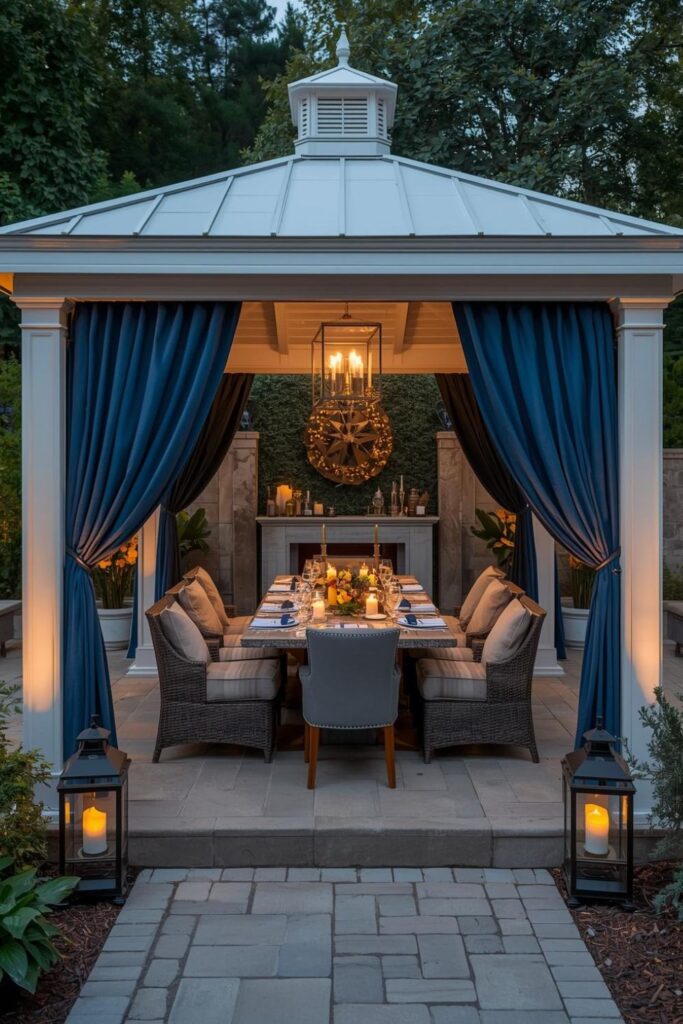Cozy Romantic Pavilion Dinner with Blue Drapes, Candles, and Soft Lighting