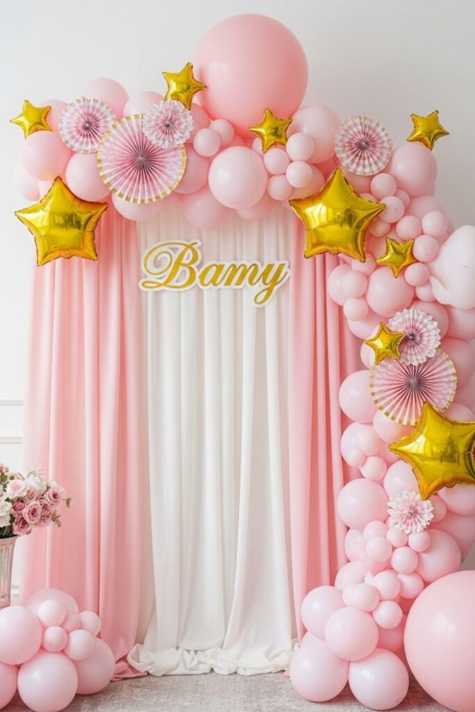 Pastel Pink Drapes for Balloon Backdrop Design With A Soft, Elegant Base for a Birthday Setup